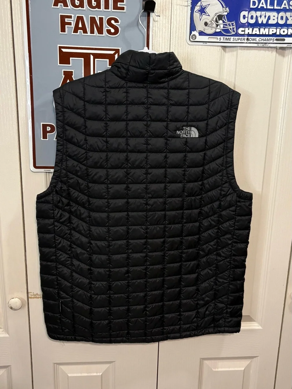 The North Face Black Quilted Puffer Vest with UT HSC Embroidery